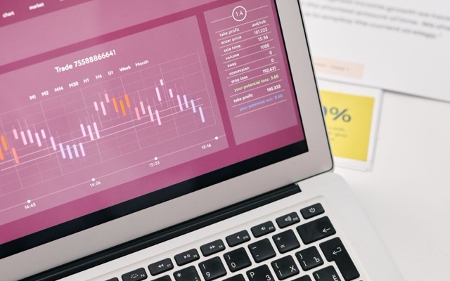 Laptop displaying analytics graphs